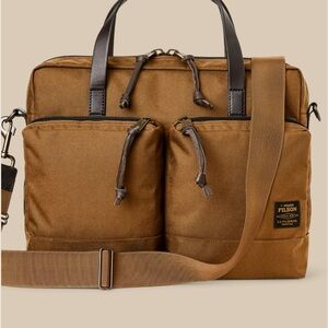 EUC Filson Dryden Briefcase. Like new. Please see stock and actual pictures.